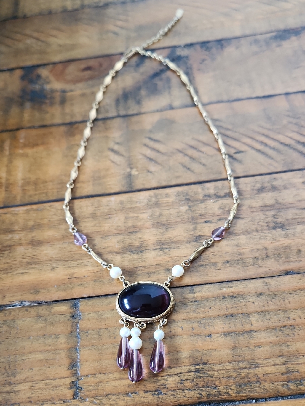 Gold-Tone Necklace with Deep Purple Cabochon and Amethyst Drops